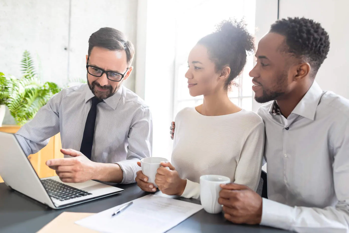 man and woman couple filing taxes with guidance from tax advisor