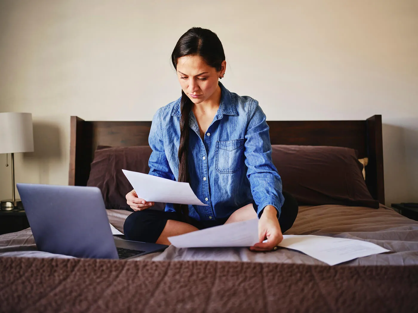 Woman researching unemployment assistance