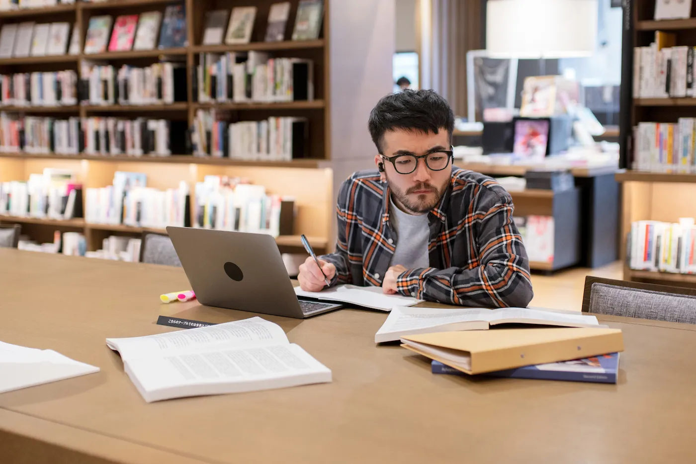 College student studying in a library