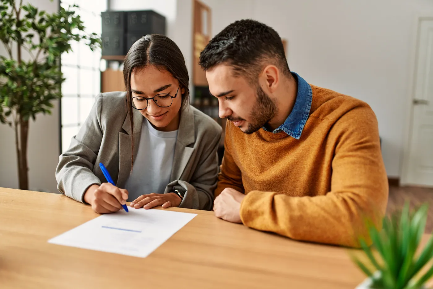 Couple signing mortgage