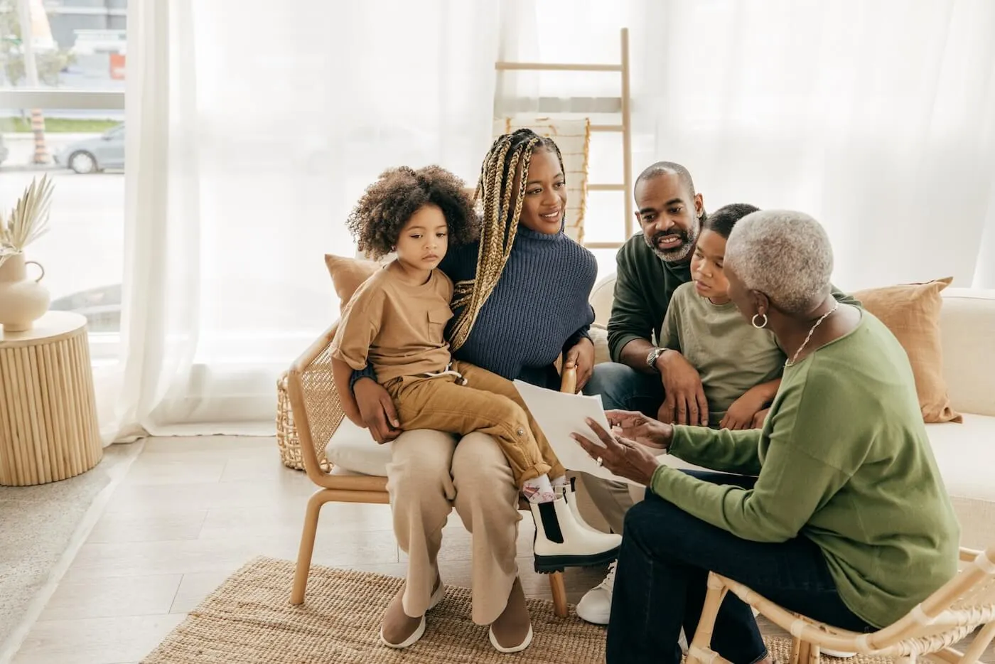 A family of four is discussing an equity loan with a mortgage broker