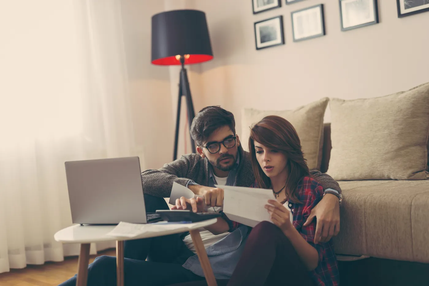 Young couple managing their money