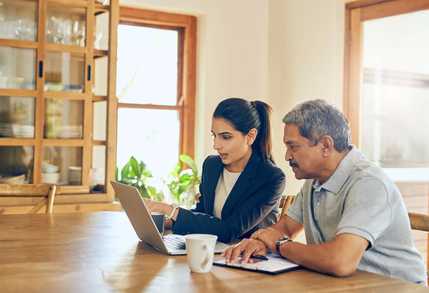 Shot of a man getting advice from a woman at home