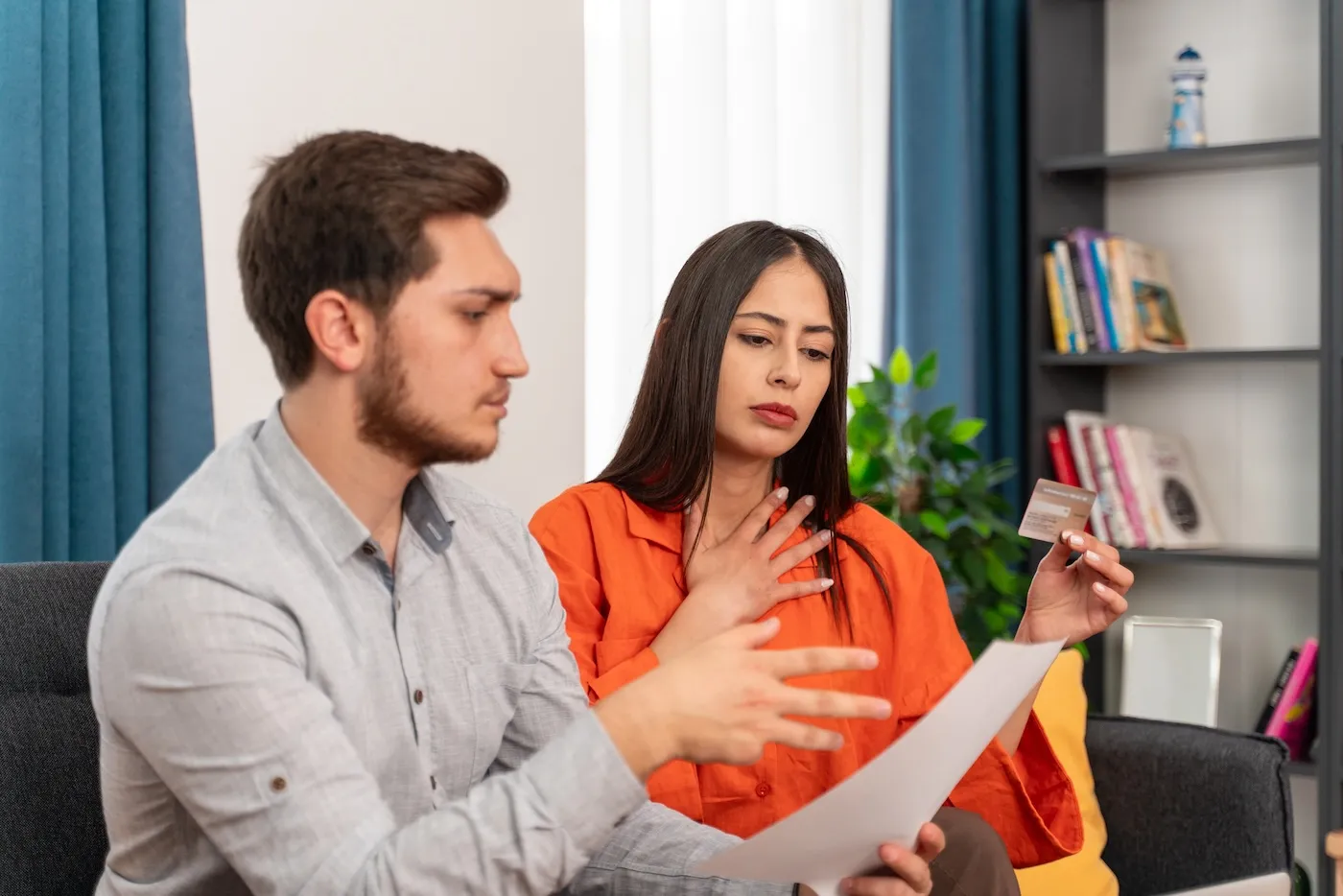 Stressed couple, They are trying to strengthen their credit files.