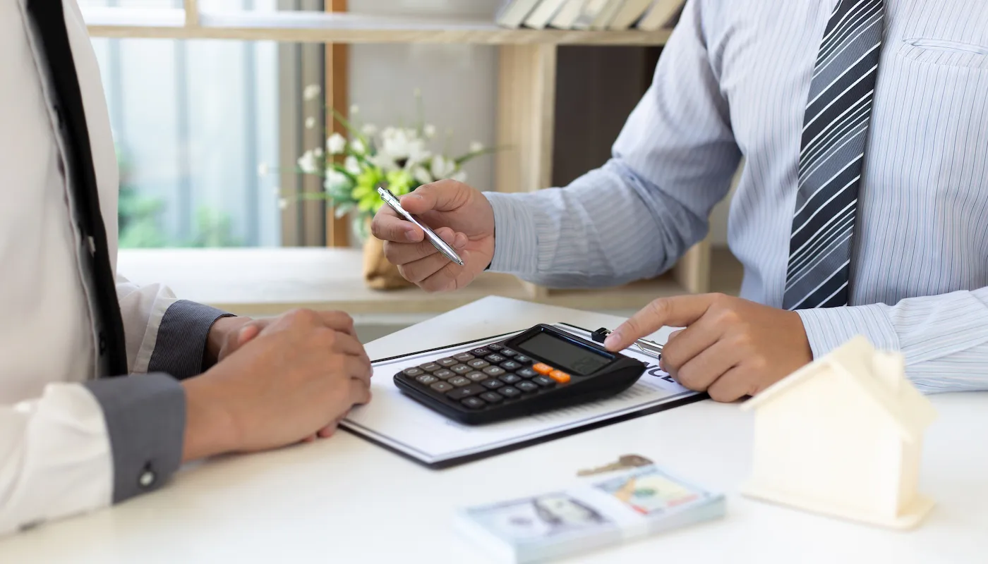 A loan counselor helps a client learn about options