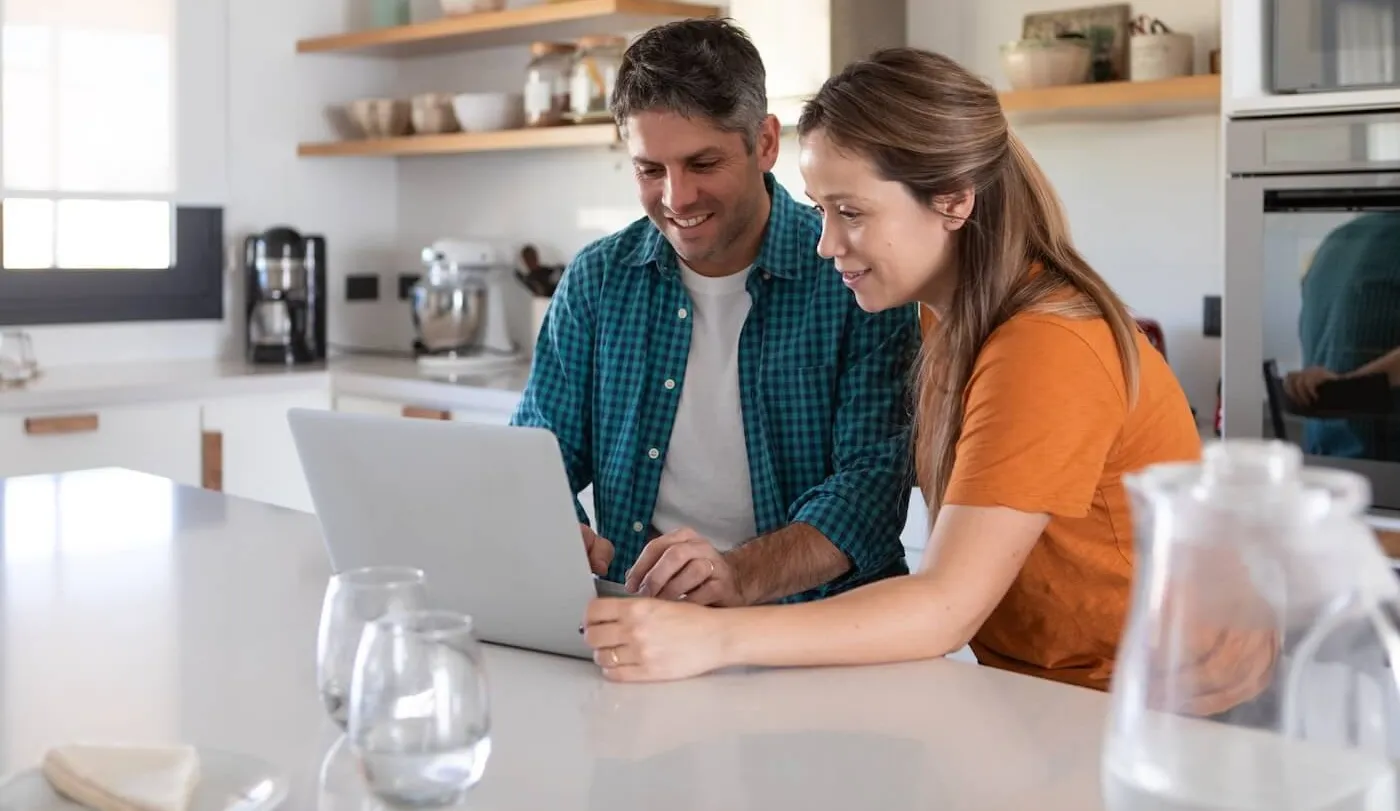 Couple paying taxes online