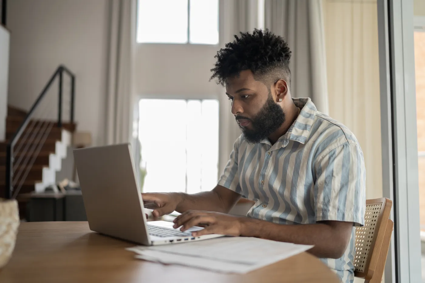 Young man working at home