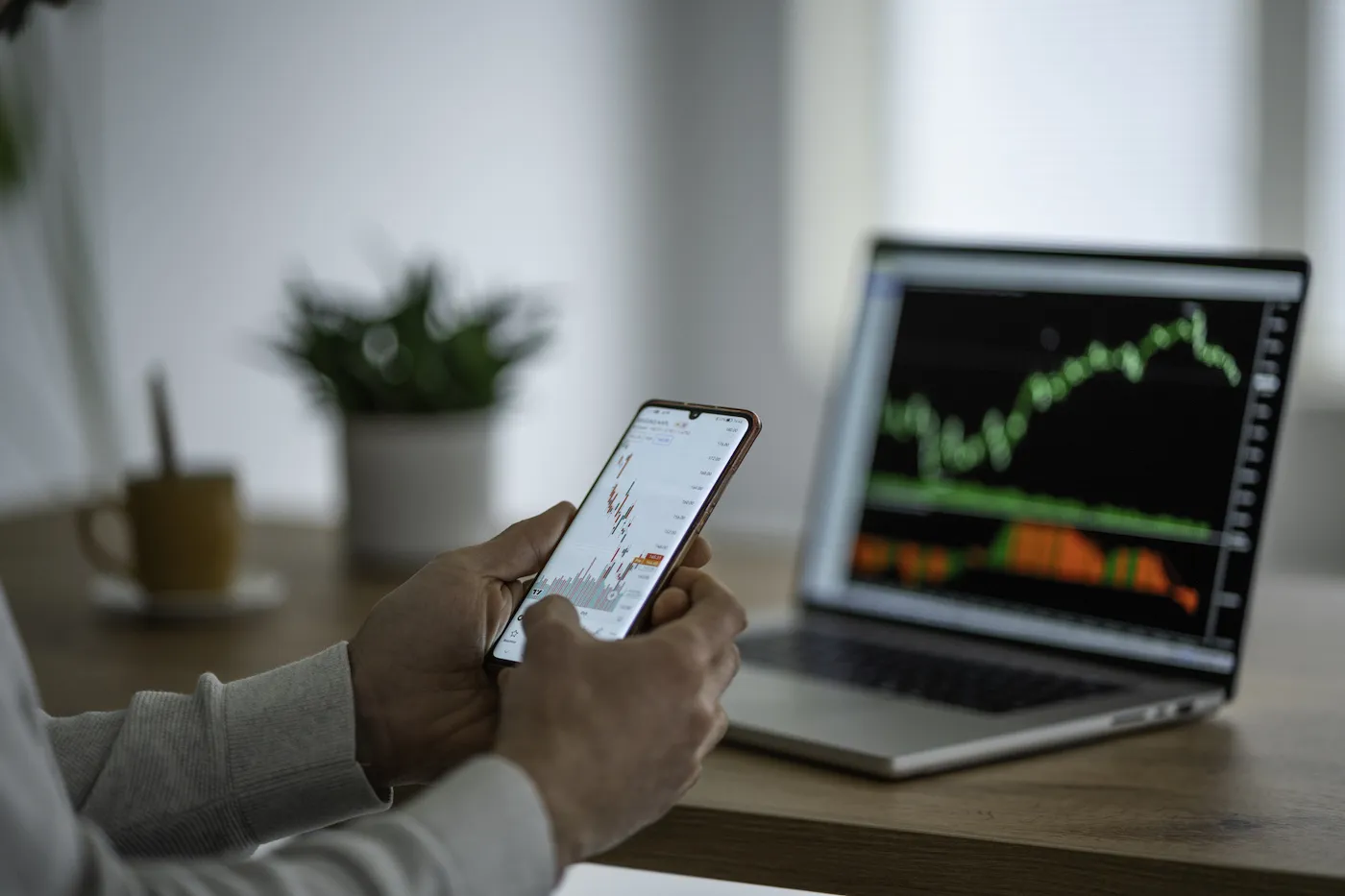 Man checking on trading positions and stock markets.