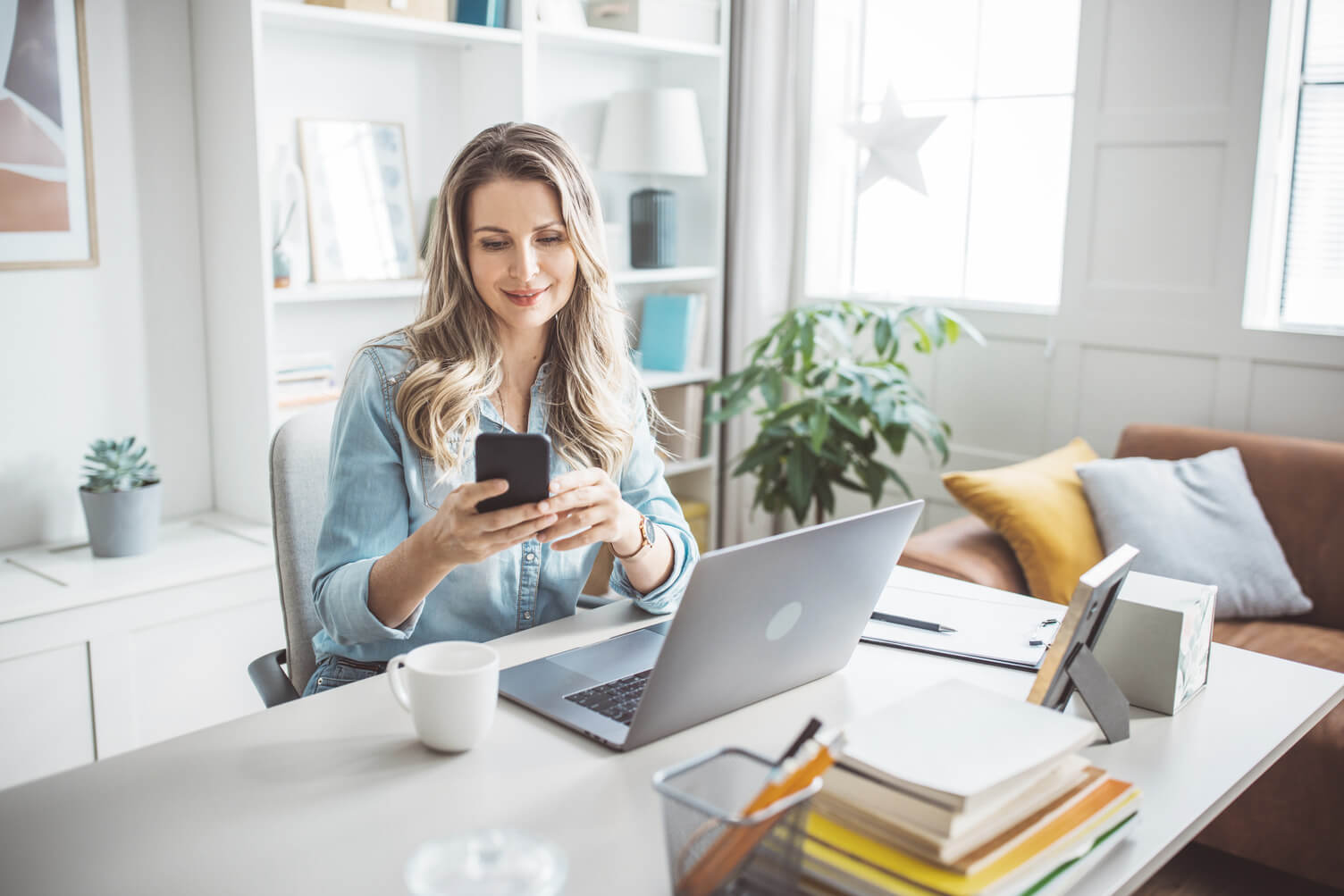 Small business owner making loan payment