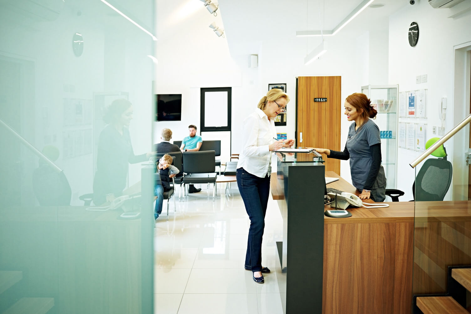 patient registering at doctor's office