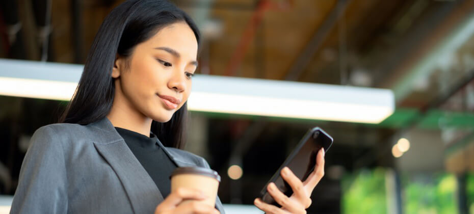 Woman registering for appointment on her cell phone